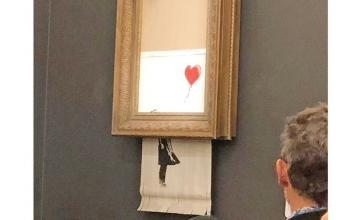 Banksy painting Girl With Red Balloon 'self-destructs' after being sold for £1m at Sotheby's