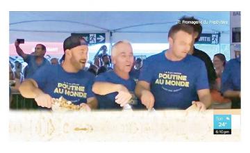 Cheesemakers create 6,700 pounds of poutine for world record