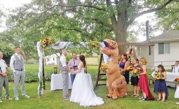 Bride's sister wears a T-Rex costume to wedding