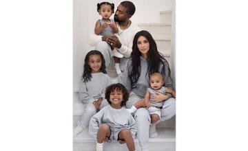 Fans accuse Kim Kardashian of photoshopping her kids in family Christmas card