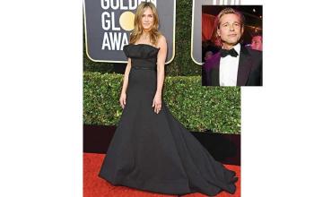 Jennifer Aniston seemed quite happy to see Brad Pitt bag a Golden Globe