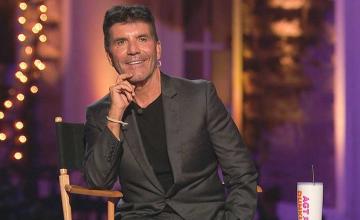 Simon Cowell undergoes surgery after falling from a bike