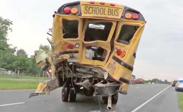 Truck driver dies after helping children get out of school bus crash