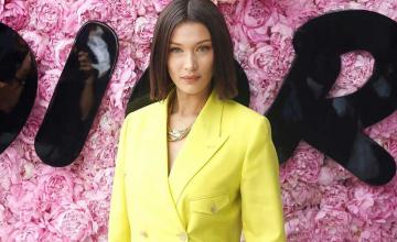 Bella Hadid is searching the photographer who offered help after her 2016 runway fall