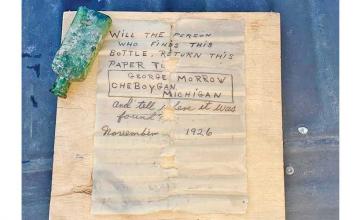 Diver finds message in a bottle from 1926 and reunites note with late writer's daughter
