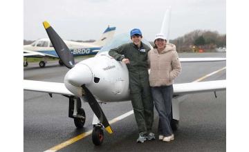 SIBLING AROUND-THE-WORLD AVIATORS SET ANOTHER YOUTH RECORD