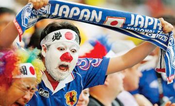 Japan fans clean up stadium after World Cup match
