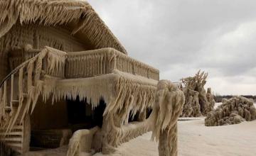 New York homes encased in ice after freezing temperatures and strong winds