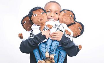 Mom and nine-year-old son launch 'Our Brown Boy Joy' doll line honouring black youth who've been killed