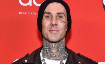 Travis Barker goes incognito without face tattoos in Machine Gun Kelly's New Music Video