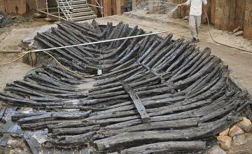 Archaeologists examine 'extremely rare' 1,300-year-old ship they need to water every 30 minutes
