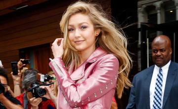 Gigi Hadid honours Tommy Hilfiger and suits up in royal blue menswear look