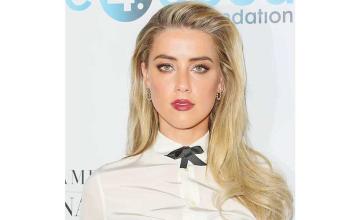 Amber Heard settles her Johnny Depp defamation case, calls it a ‘difficult’ decision