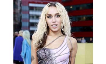 Miley Cyrus defends her decision to not tour in the near future